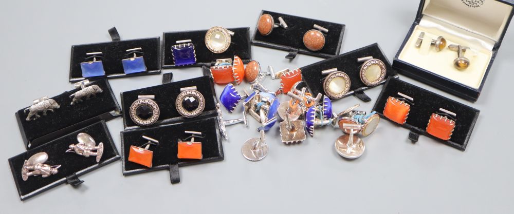 Three pairs of white metal figural cufflinks and eighteen pairs of white metal and stone/glass mounted cuff links, all marked 925